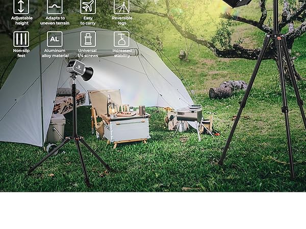 Outdoor camping setup with white tent, portable kitchen, and tripod. Icons indicate features like adjustable height, uneven terrain use, and aluminum alloy material. Grassy area with trees in background.