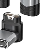 Another view of the same black electronic device or charging component with USB-C port shown from slightly different angle.