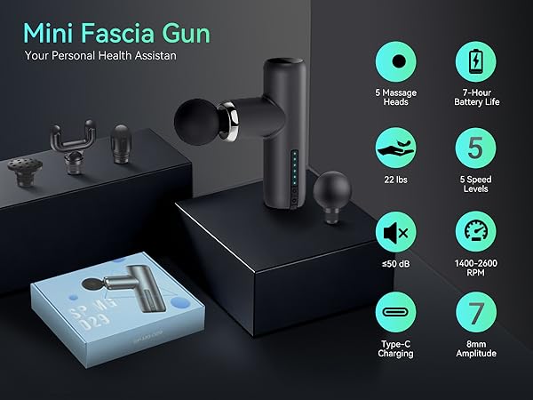 A mini massage gun stands on the platform
