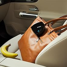 Portable label maker fitting into purse