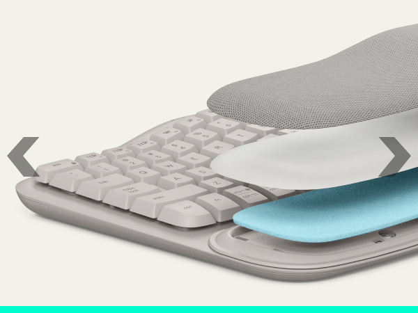 a keyboard with palm rest showing its layers