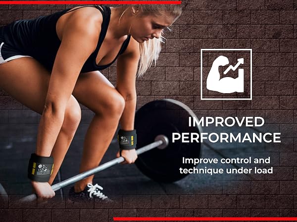 Female athlete wearing wrist wraps for CrossFit training