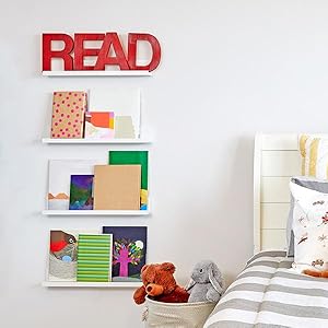 Children's Book Display with Quartz picture ledges next to a kid bed