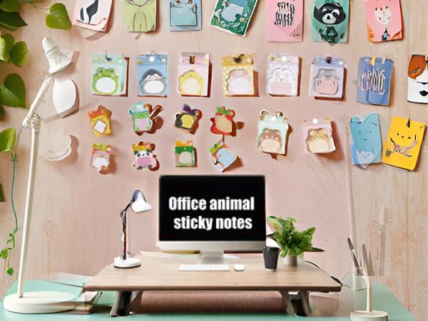 A colorful array of office supplies scattered on a wooden desk, including pens, pencils, and the pro