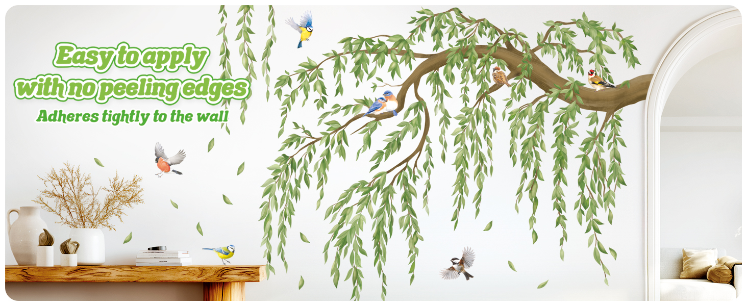 Text reads 'Easy to apply with no peeling edges'. Wall decal showing green willow tree branch with leaves hanging down, birds, and nature elements.