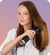 woman using dual voltage blow hair brush