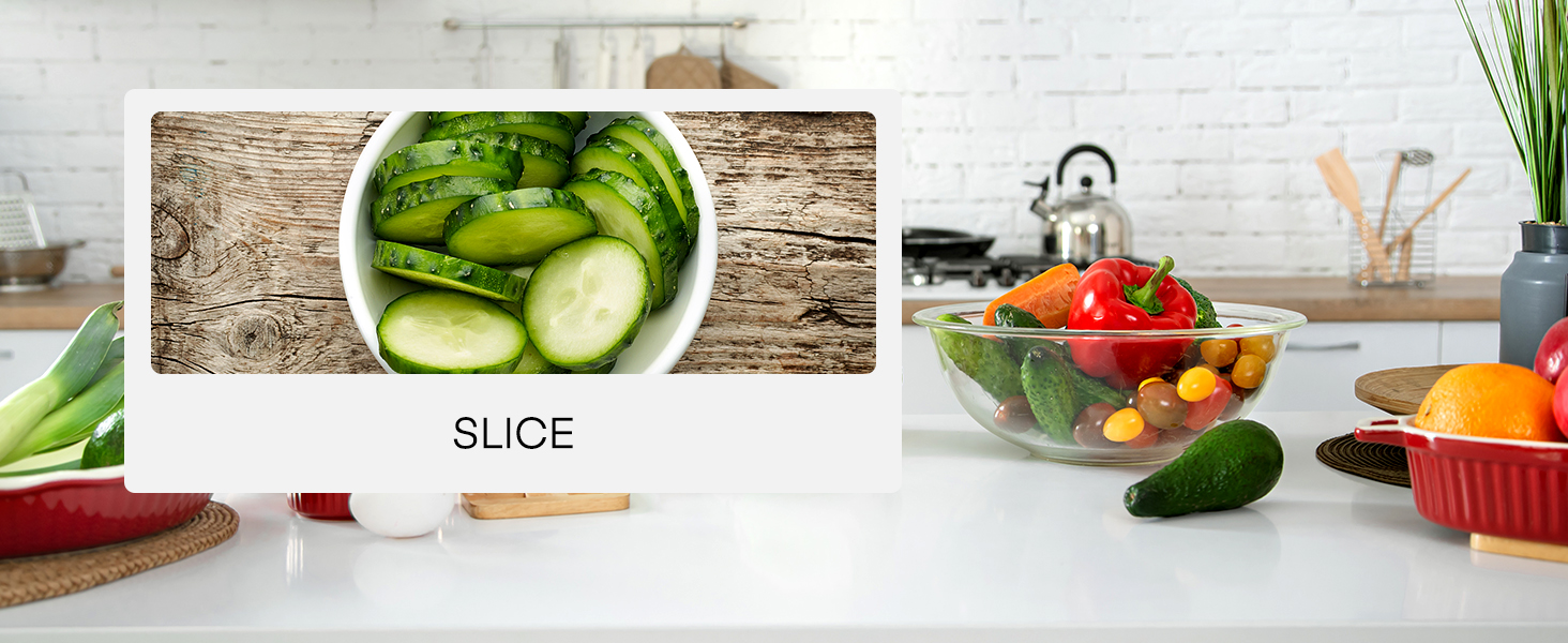a bowl of sliced cucumbers next to a bowl of vegetables.