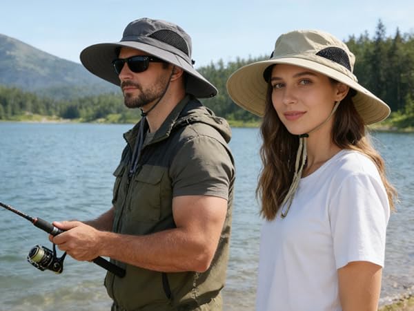 Bearded man with fishing rod & long-haired woman in sun hats by a lake. Great hat for fishing