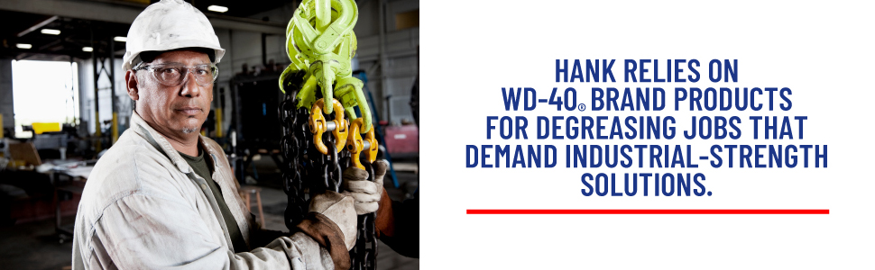 man with hardhat working with chains