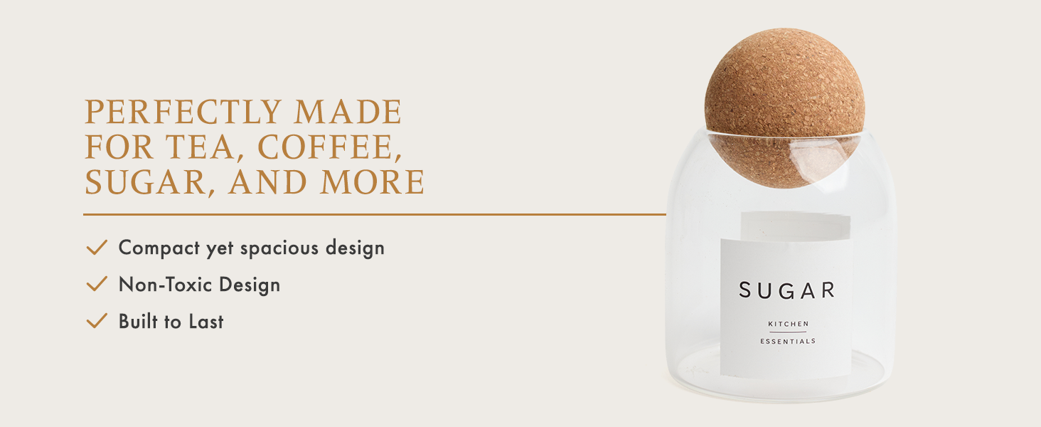 White ceramic sugar container with cork lid. Text reads 'SUGAR' on container. Product description mentions suitability for tea, coffee, sugar, and more.