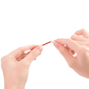 iodine solution flows onto the cotton at the other end