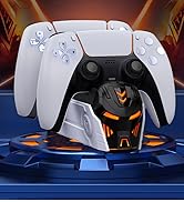 White PS5 DualSense controllers with charging dock displayed on blue illuminated platform with orange accented gaming theme.