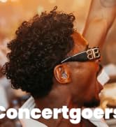 Guy cheering at concert wearing Earasers