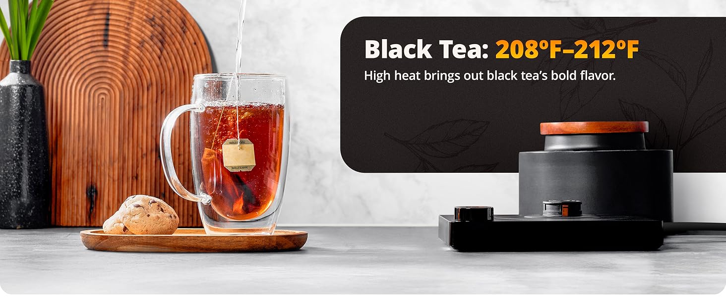 water falling into cup with teabag making black tea