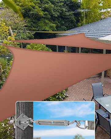 Large triangular sun shade installed over an outdoor area. Inset image shows a metal tensioning device.