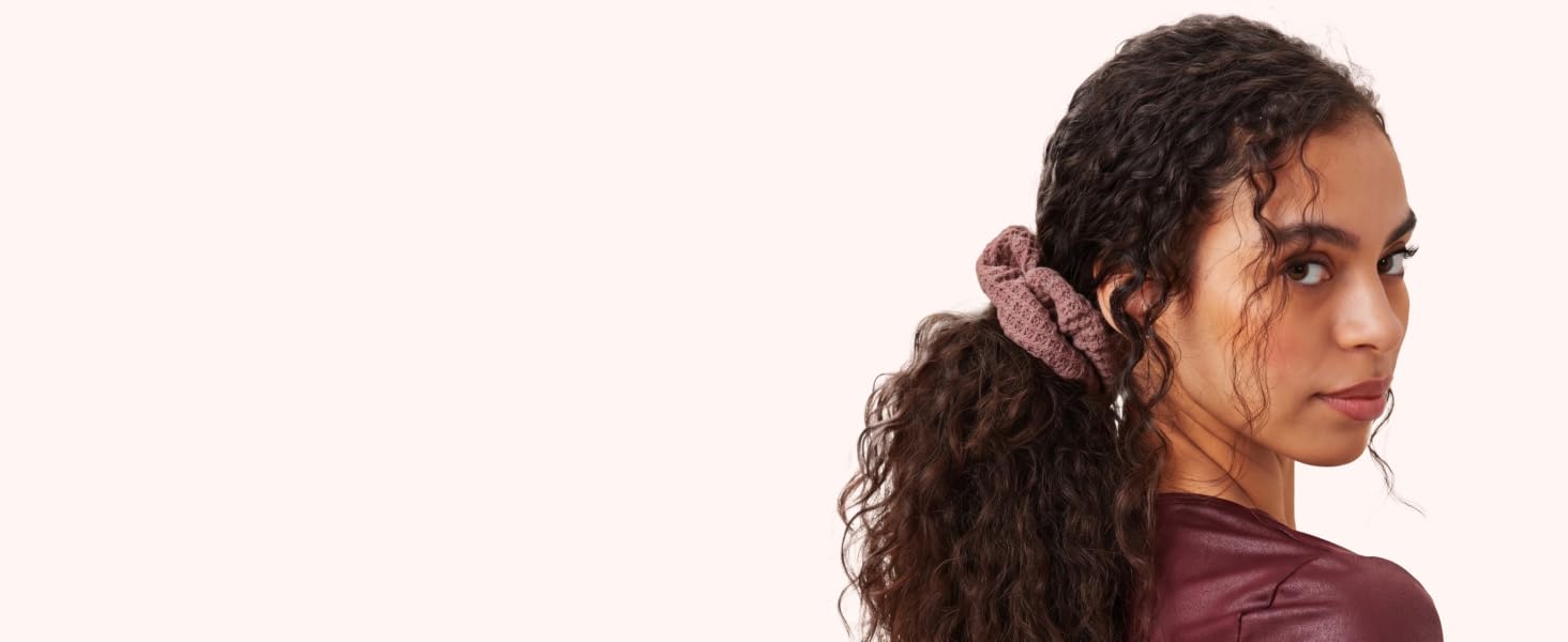 Curly hair in scrunchie