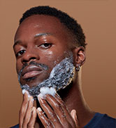 pesron washing beard with the beard wash