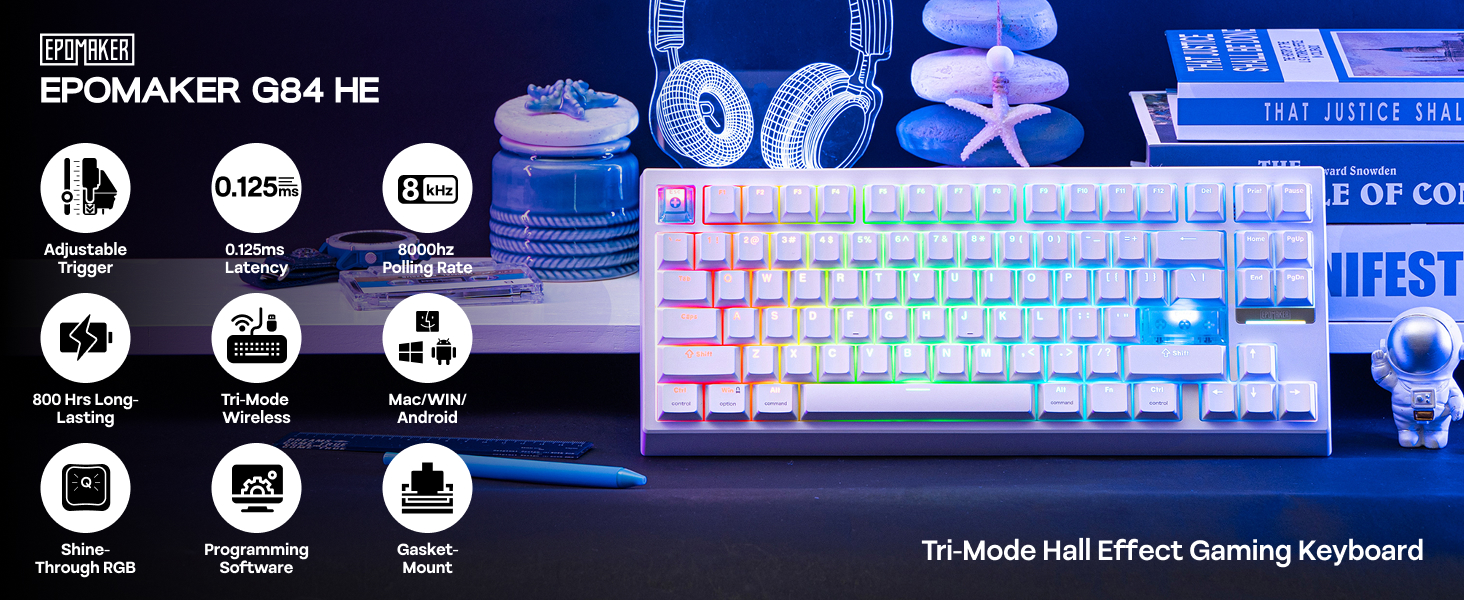 Gaming keyboard with RGB backlighting displaying rainbow colors, featuring mechanical keys and multimedia controls. Multiple views showing different lighting effects.