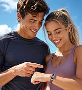 Young couple checking fitness activity on a smart band