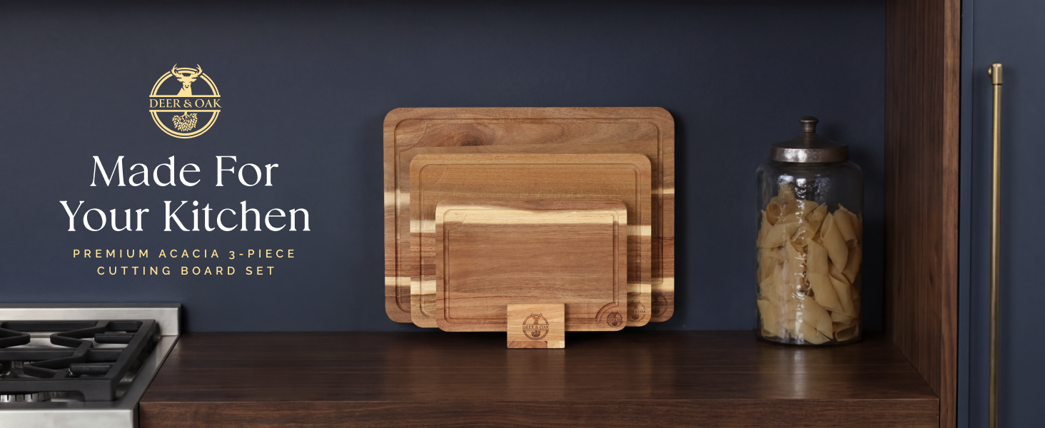 Acacia Cuttiing Board 3 piece set displayed on kitchen counter