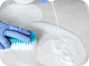 Comparison of shower stickers versus traditional bath mat