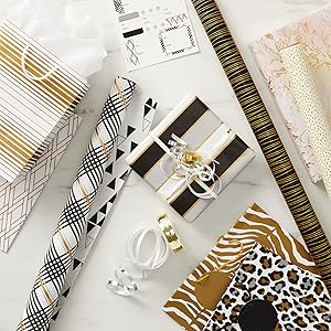 Elegant wrapping paper in black, white and gold, animal print gift bags