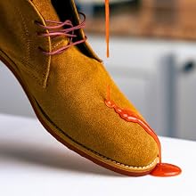 Close-up sequence of tan suede desert boot with pink laces, showing different angles and details of the shoe construction and stitching.