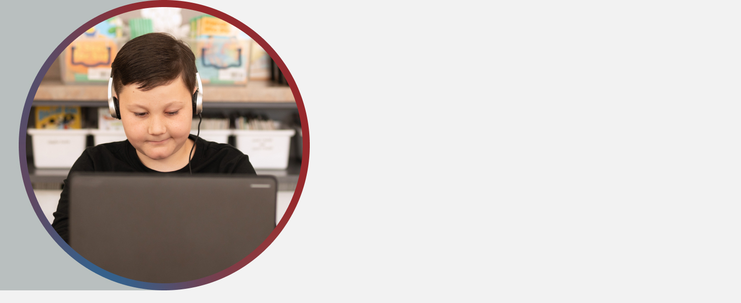 Headphones that improve focus. Young child studies on laptop with headsets on.