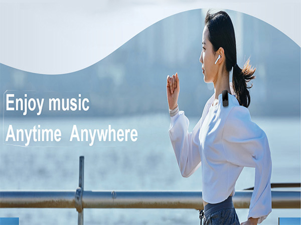 Marketing banner with text 'Enjoy music Anytime Anywhere' showing outdoor scenery with railing and water in background.