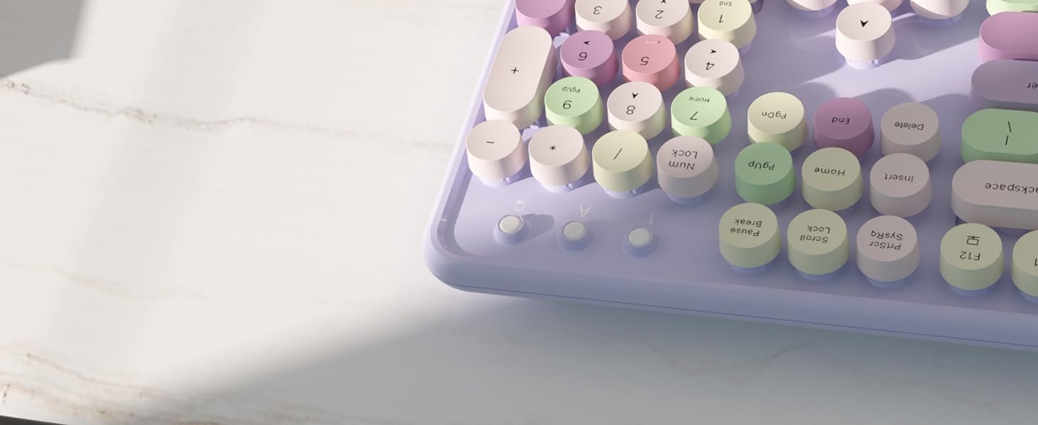 purple colorful wireless keyboard and mouse