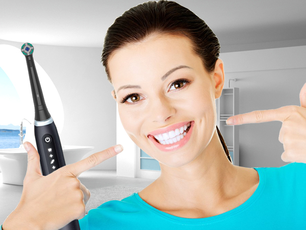 Electric toothbrush and dental floss held up next to smiling woman in teal shirt, demonstrating oral hygiene products.