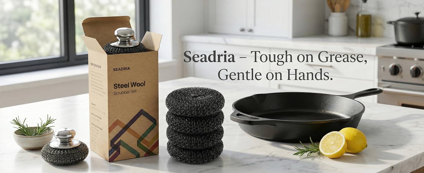 Stainless steel scrubber with metal handle on cast iron skillet for heavy duty cleaning.