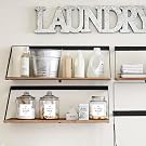 Organized laundry room with Mintitude labels