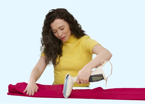Woman using steamer