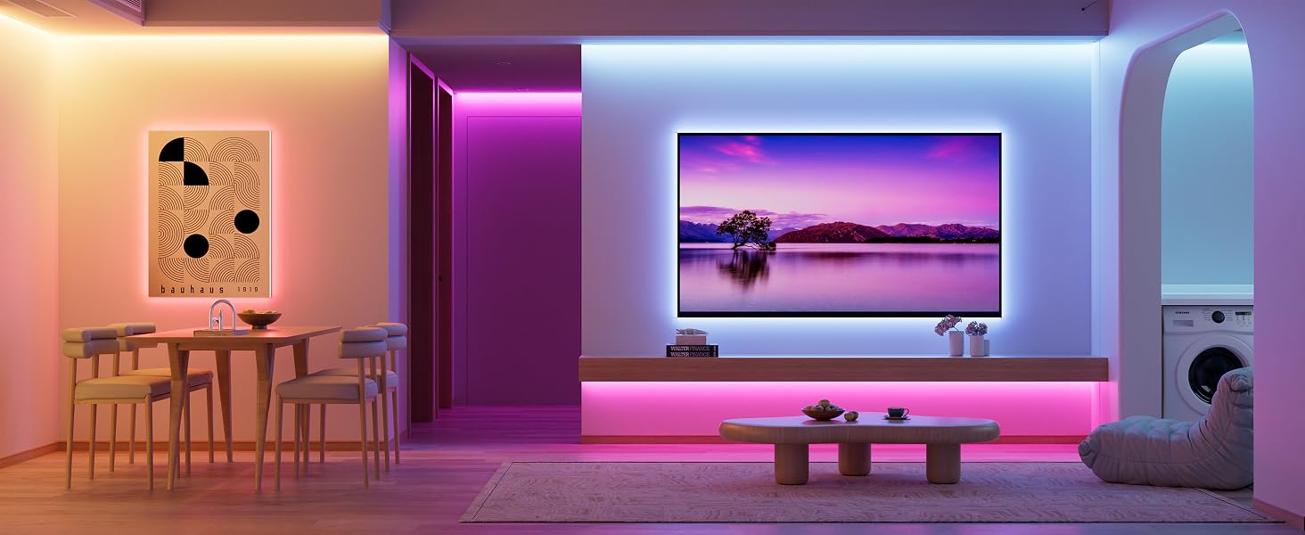 Modern entertainment room with purple LED accent lighting, featuring mounted TV screens and sleek furniture against dark walls.