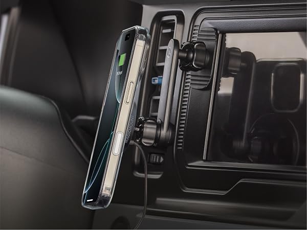 Dash phone holder for car with a swing arm magnetic car mount moves clear of screens and controls