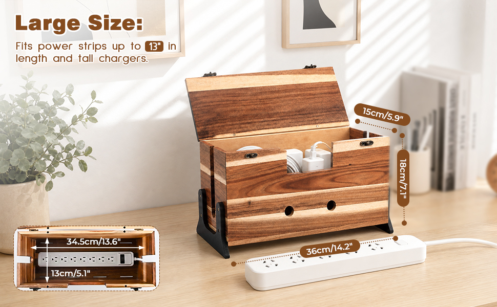 Extra large cable management box storing a long surge protector and bulky laptop adapters.