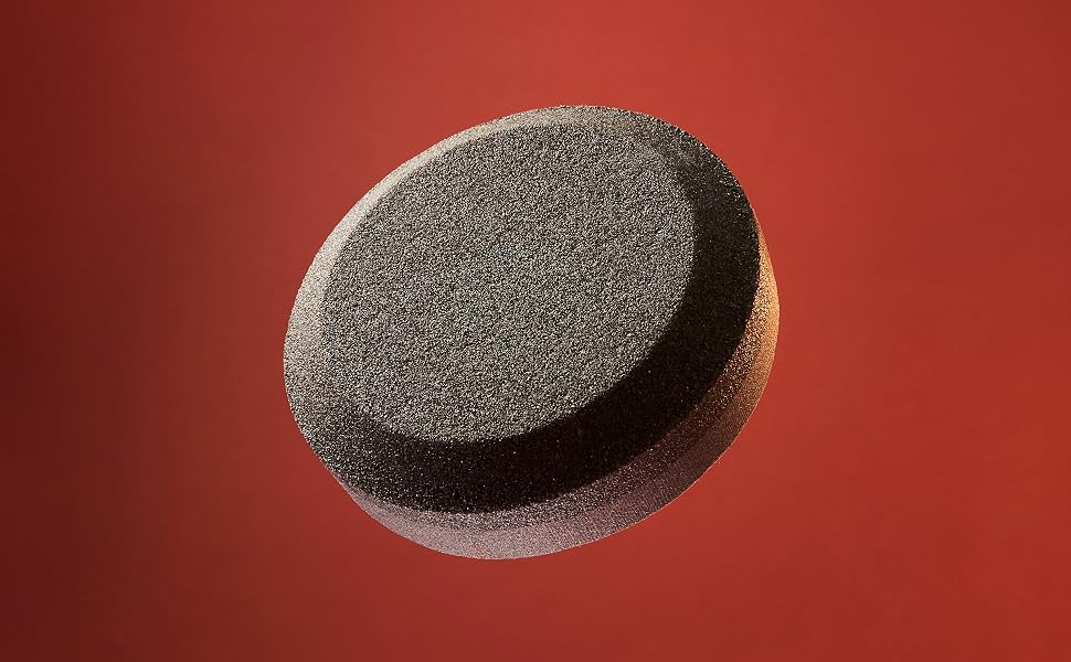 Lpuck over a red background
