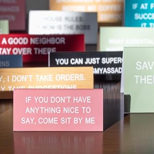 funny desk signs on a desk