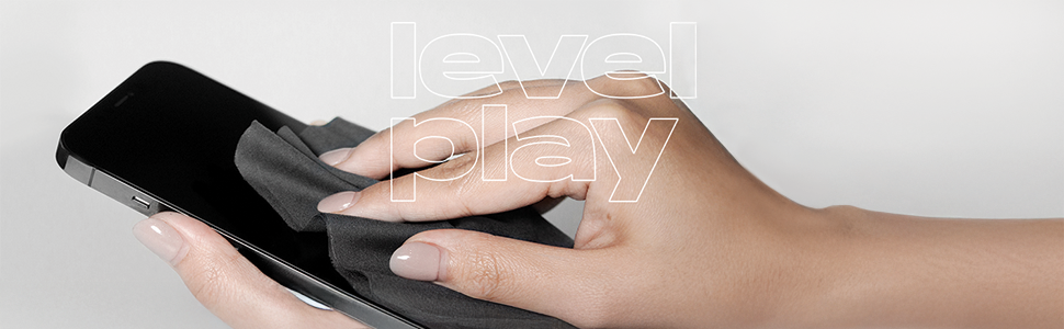 Hand holding a sleek black smartphone with a large touchscreen display. Fingers are interacting with the screen, demonstrating touch functionality.