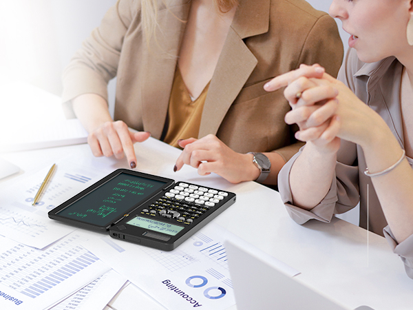 Calculator and digital tablet on desk with financial documents, shown during business discussion or consultation.