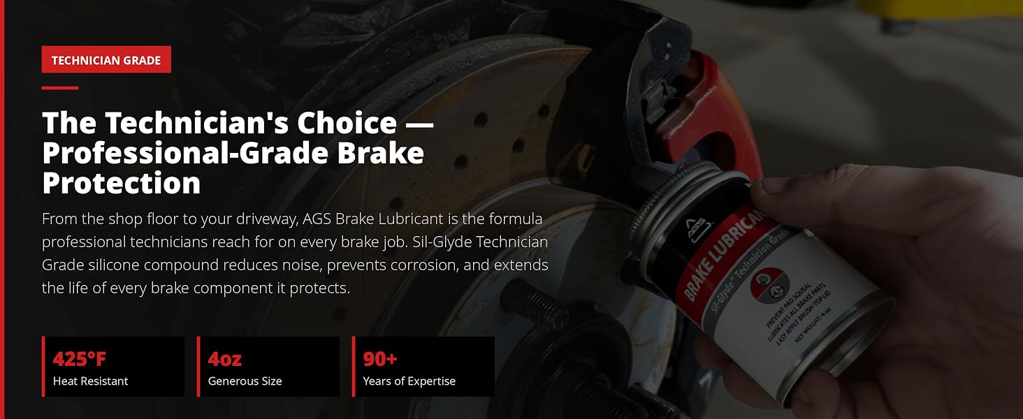 Mechanic applying AGS Brake Lubricant to caliper pin with 425°F, 4oz, and 90 years expertise badges