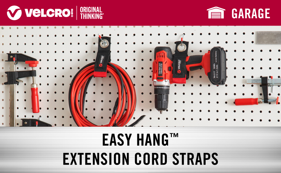 wrap heHeavy duty VELCRO Brand extension cord strap holding 50 ft power cord on garage wall hook