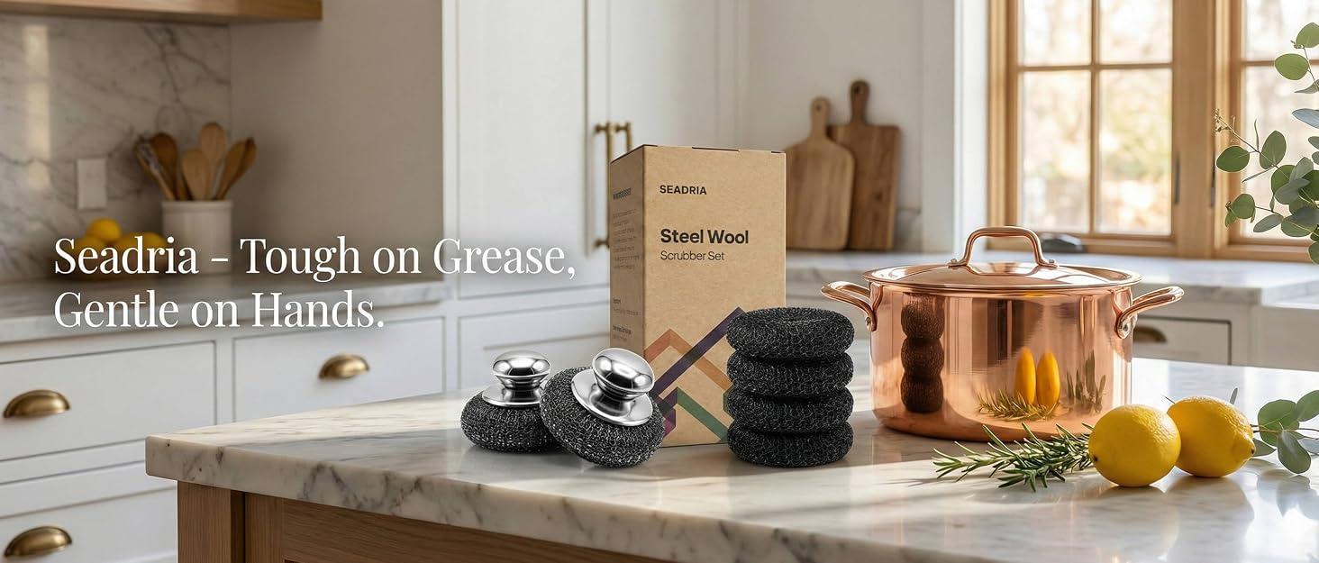 Stainless steel scrubber with metal handle on cast iron skillet for heavy duty cleaning