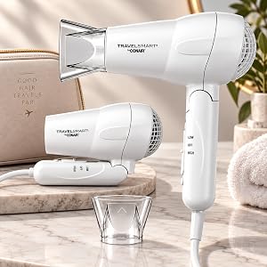TravelSmart by Conair travel hair dryer open and folded on counter near pouch