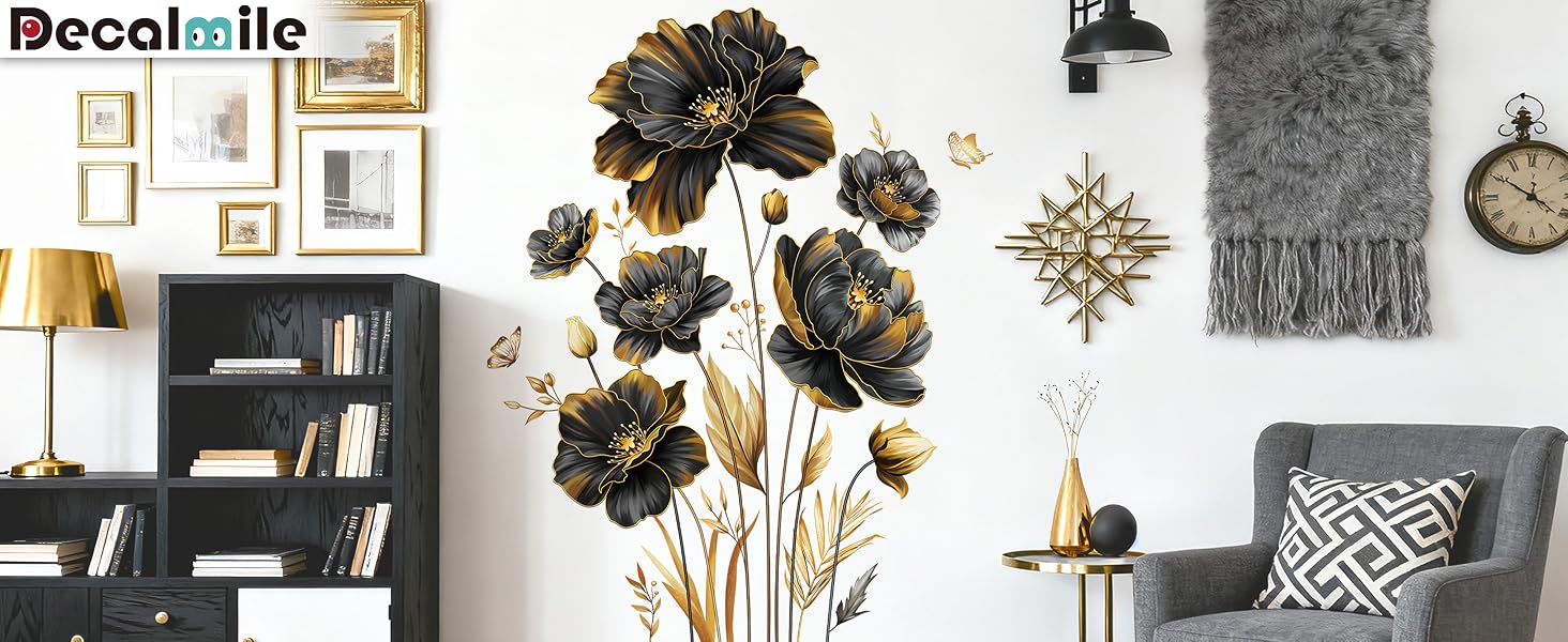 Text reads "Decalastic". Interior room setting with wall art, dried flowers, and home decor items displayed.