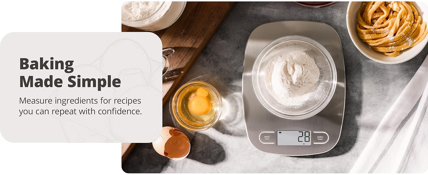 greater goods stainless steel kitchen scale on marble counter weighing bowl of flour