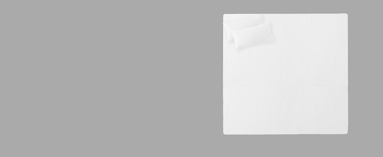 Oversized king quilt set in natural white with decorative stitching and soft feel