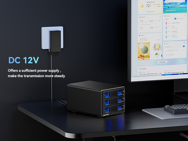 a computer monitor with a blue led light on it.