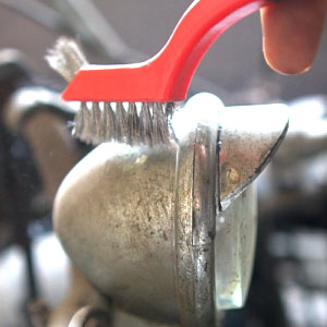 Stainless Steel brush performing heavy duty scrubbing